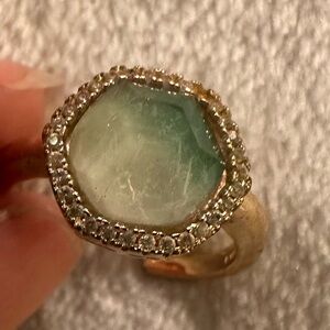 Adjustable gold ring with green stone. Never worn. Bought from fab, fit, fun